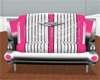 (m) Pink cadillac sofa