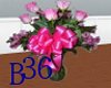 purple roses with bow