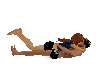 - Laying couple kiss -