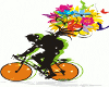 Man on a bike w/flowers