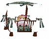Vic -Doll in cradle