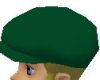 GREEN CAP ON BLOND HEAD