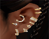 multiple gold earrings