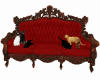 RED COUCH AND CATS