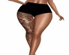 tattoo leg black shorts