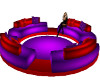 red/purple  round couch