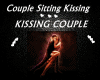 Couple Sitting Kissing