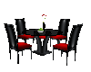 table chairs black red