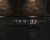 ~R Black tufted couch