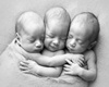 OUR TRIPLETS