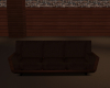 (S)Poseless brown couch