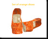 set of orange shoes