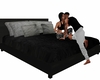 Couples kiss bed
