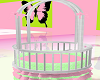 pink and green crib