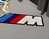в M Power rug.